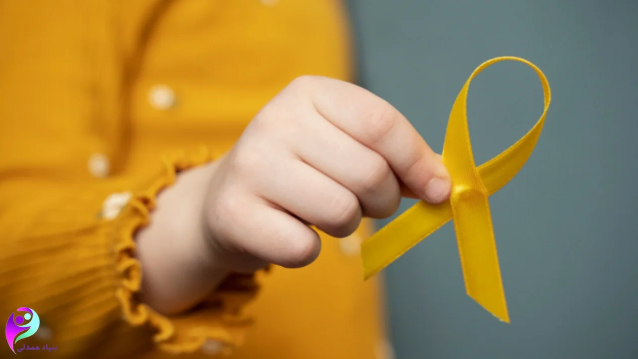 نماد سرطان در دست کودک سرطانی